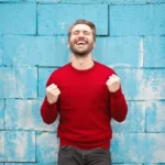 happy_man_in_red_pullover